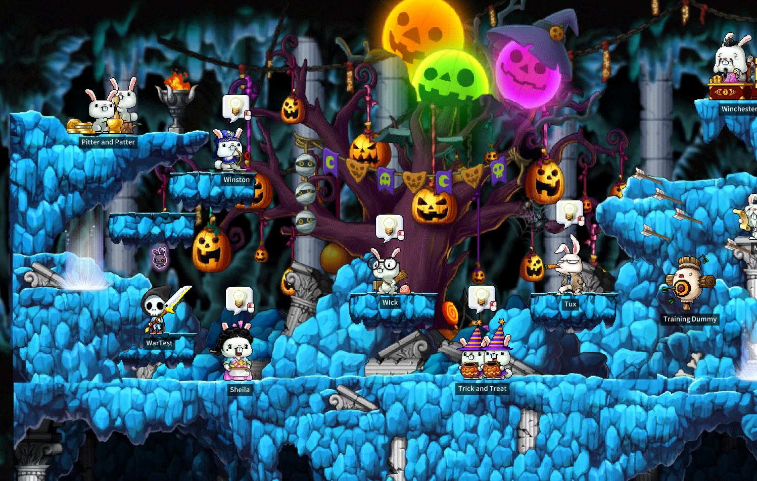 The new Den: a haunted tree hung with jack-o'-lanterns over the rabbits' cave, with Trick and Treat at the front